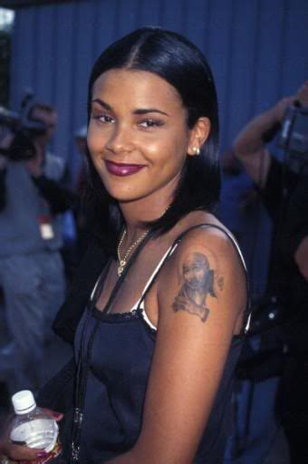 kidada jones tupac tattoo removed.